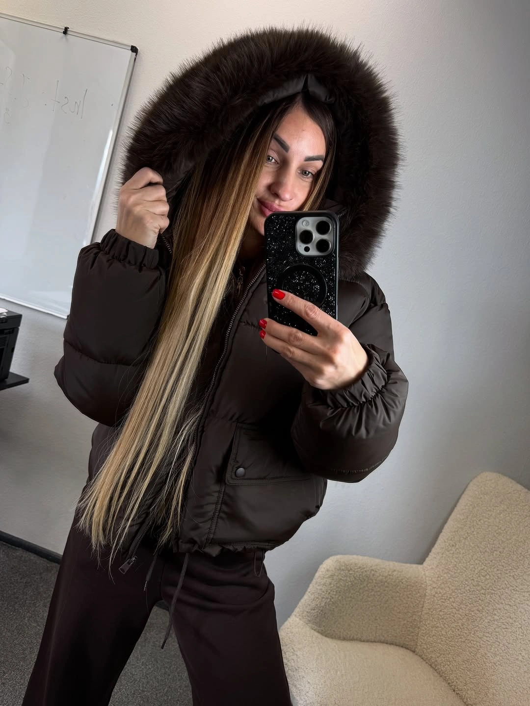 Chocolate brown puffer jacket with oversized dark plush hood and matching pants.